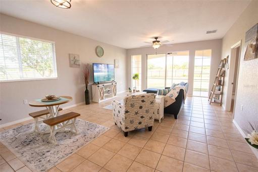 Open floor plan with sliders to screened lanai.
