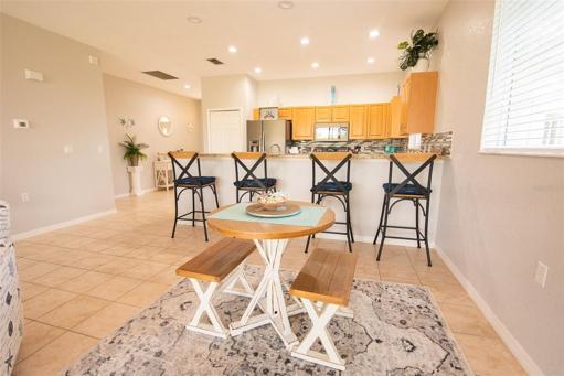 Breakfast bar and living room/dining area combination