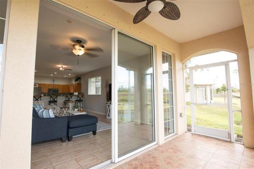 Facing living room from screened lanai