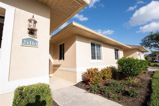 Welcoming entry and well-groomed landscaping