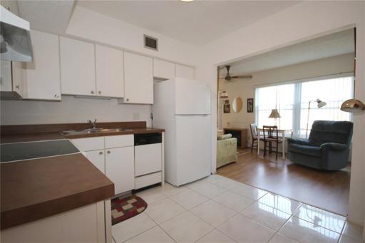 Kitchen with Florida room behind it