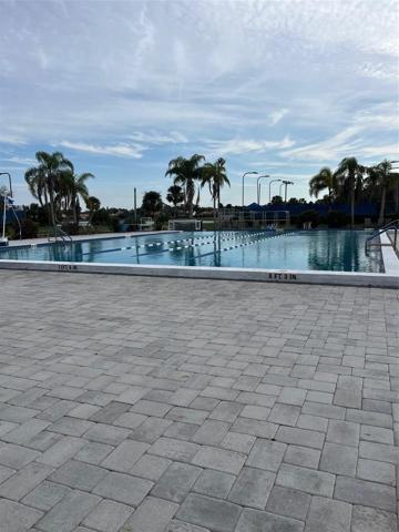 Walk to Country Club of Sarasota Sports Club membership available