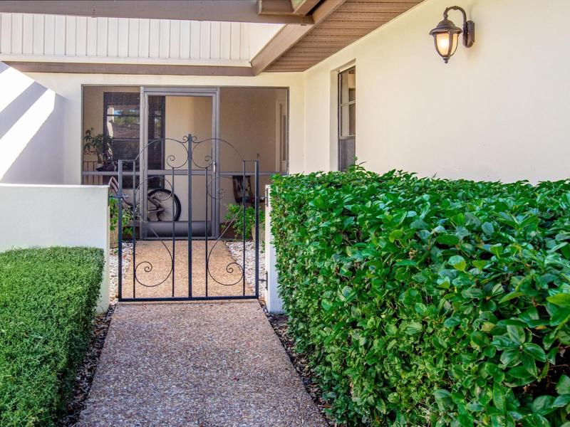 Gated entry and screened porch