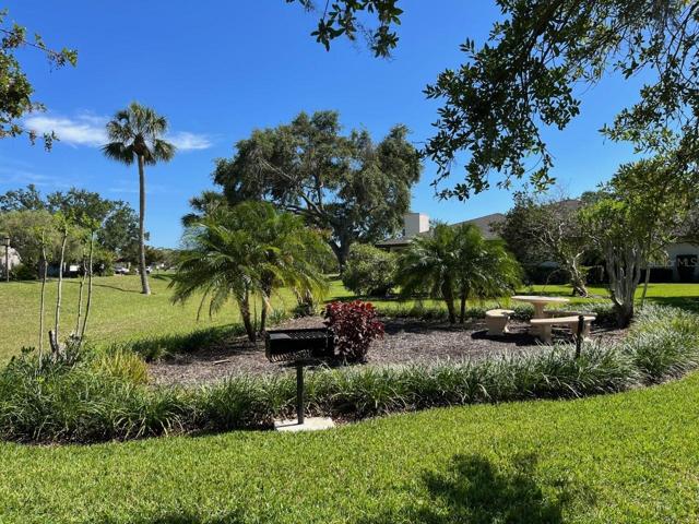 Community BBQ grill and picnic table