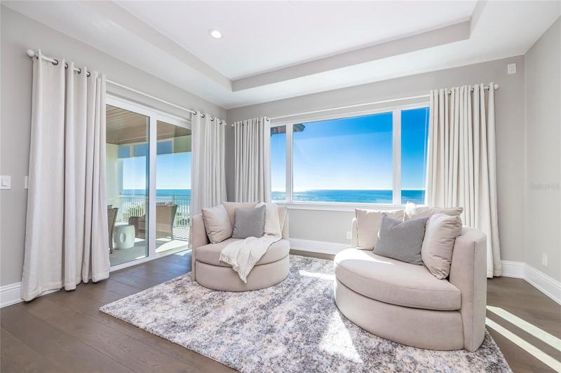 Sit and relax in this sitting area in the main owners retreat.