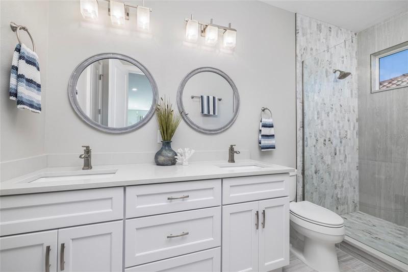 Secondary owners ensuite bath.
