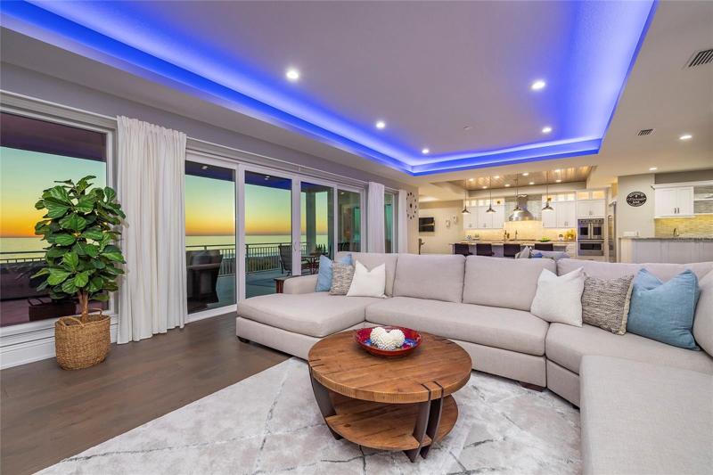 Walls of glass sliders provide panoramic gulf views.  Doors are hurricane impact resistant.