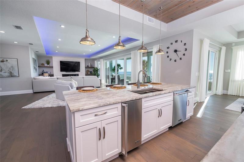 Wonderful blend of great room, kitchen and dining and it all opens to a huge balcony.