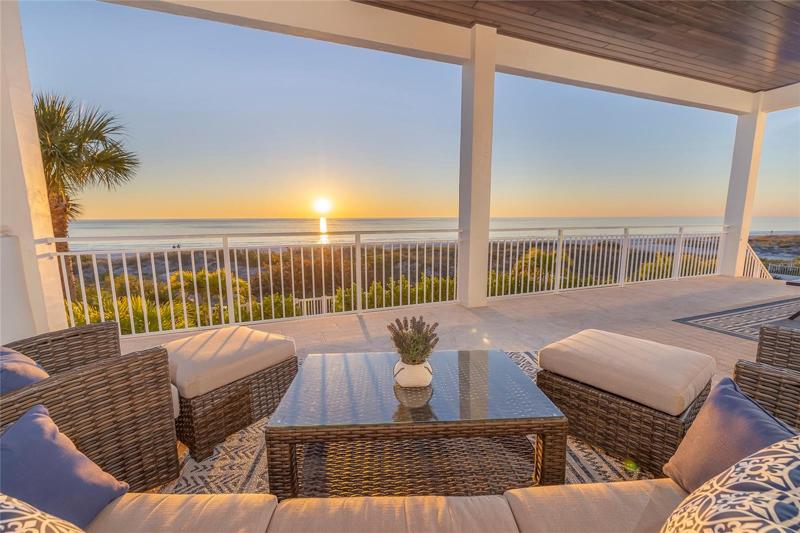 Grand balcony on the second level  can be accessed from the great room and the kitchen dining room.