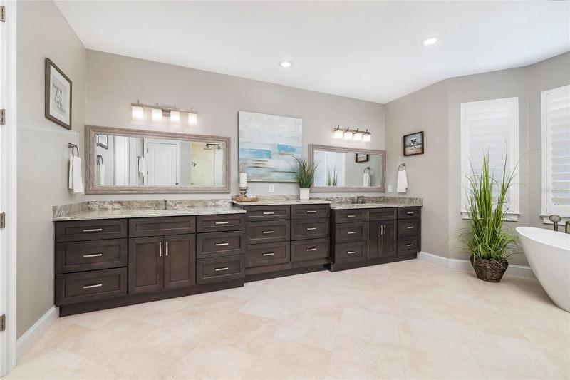 Furniture quality cabinetry and high end finishes in this owners retreat bath