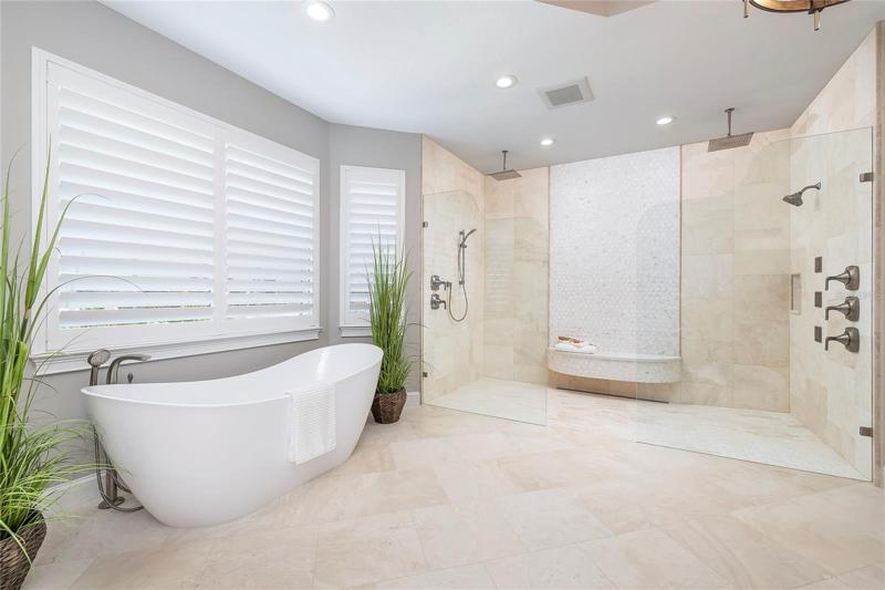 Note that you have a huge shower which a sloping entry.  Easy access for someone with special needs.