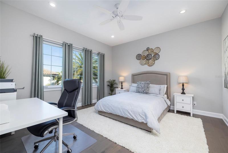 This guest bedroom suite is on the second floor just down the hall from the great room and kitchen.