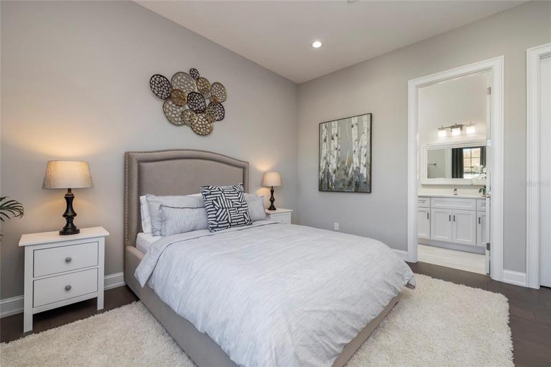 Guest bedroom on second level off hallway from the great room.