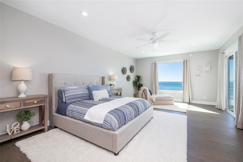 Located on the third floor this large guest suite has access to the balcony, a walk-in closet, private bath, and amazing views!