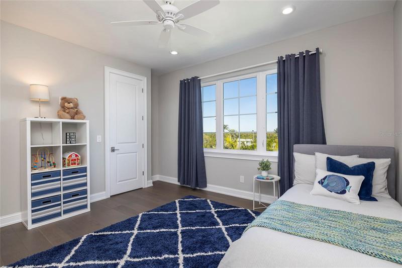 Guest bedroom on third floor.  A full bath is adjacent to this bedroom.
