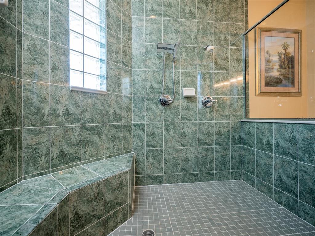Large, tiled Walkin Shower