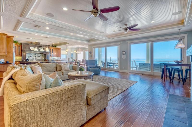Gorgeous hardwood flooring, throughout the living area, entry and kitchen