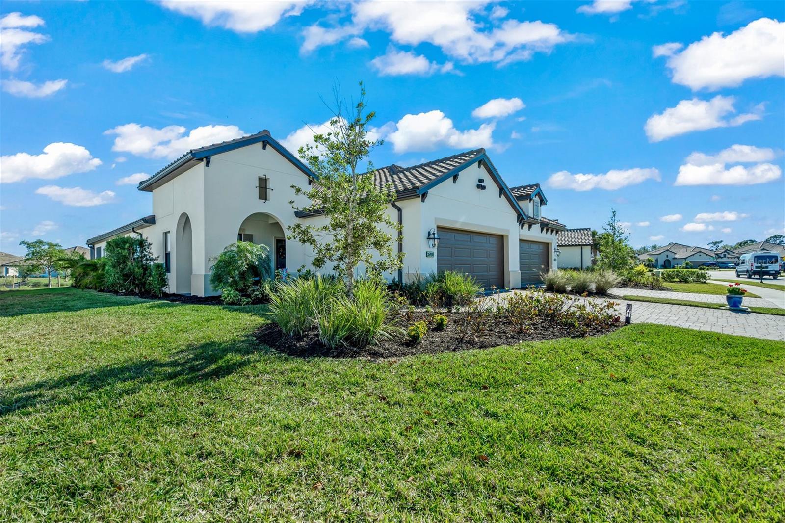 FRONT ENTRANCE TO A 3 BEDROOM WITH A WATER VIEW