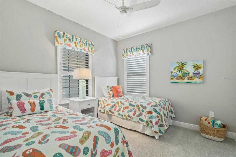 GUEST BEDROOM WITH PLANTATION SHUTTERS