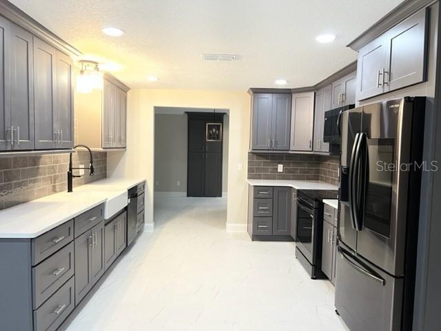 Kitchen with Blue tooth wifi Refrigerator and Stove