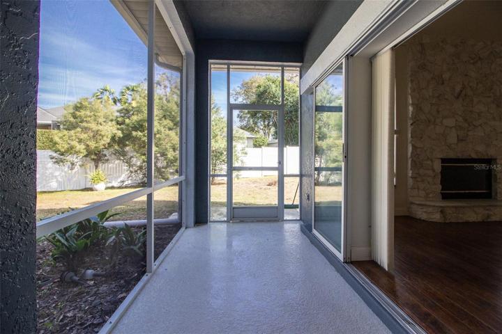 Family Room to right and access to rear yard.