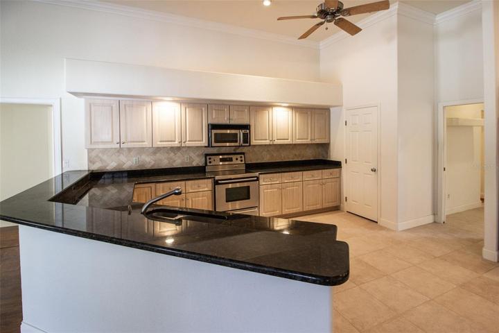 Tons of cabinetry in this large Kitchen!