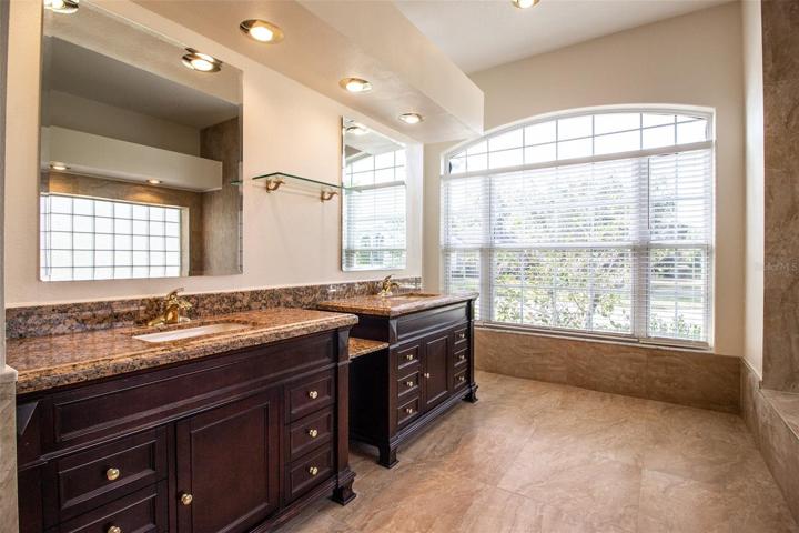 As well as two separate vanities and lots of light!