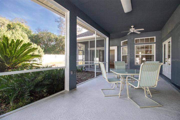 Lanai wraps around for access from Family Room as well.
