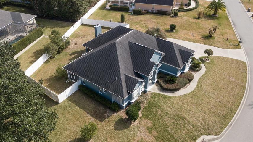 Aerial view from vacant lot side of home.