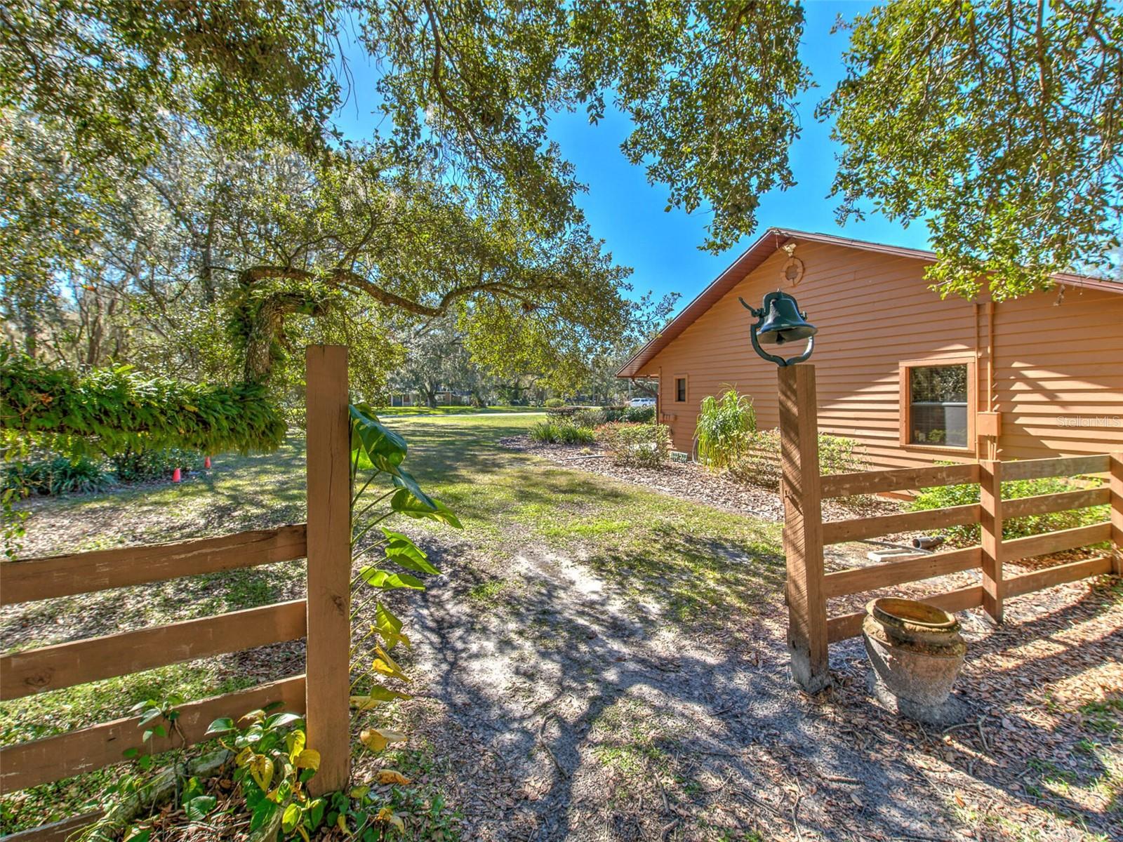 Side of home near middle of property