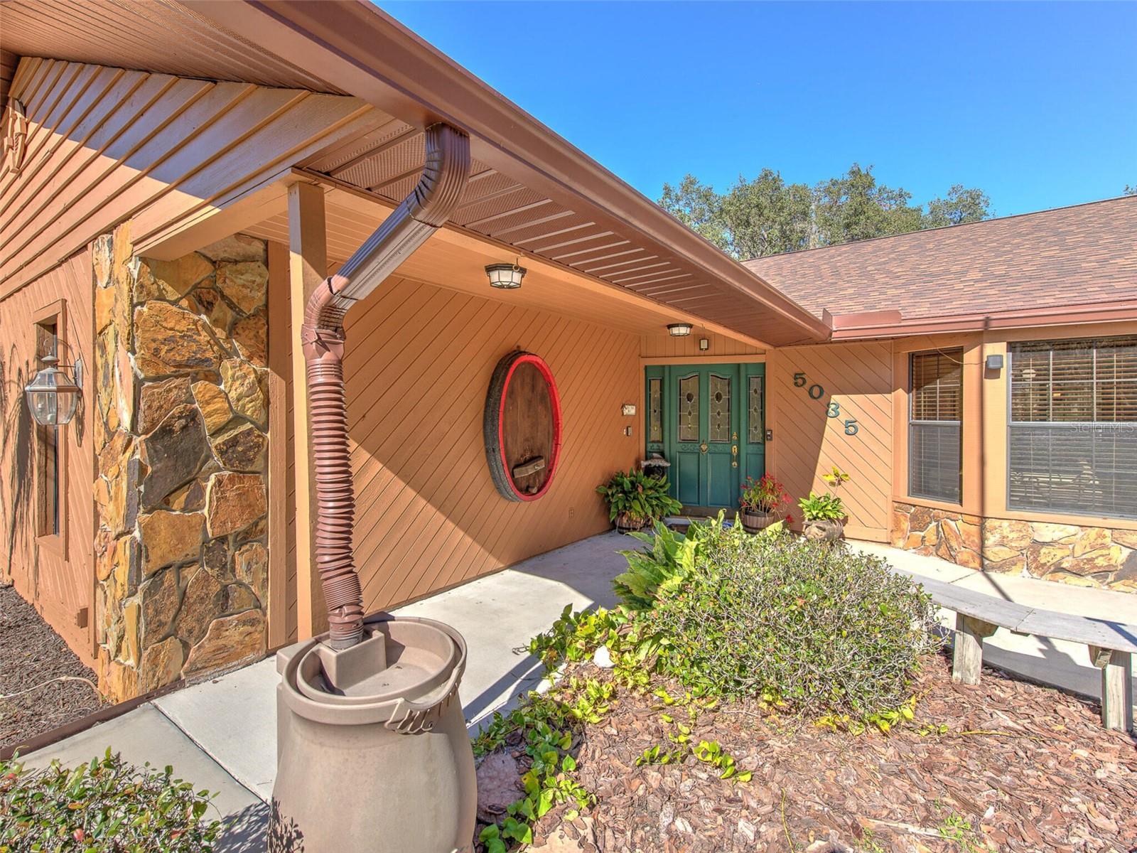 Front Entrance of Custom Home(3 Bed/3 Bath/2 Car Garage on 2.06 acres) NEW ROOF &amp; PAINT in 2022. Not in a Flood Zone, No HOA or CDD.