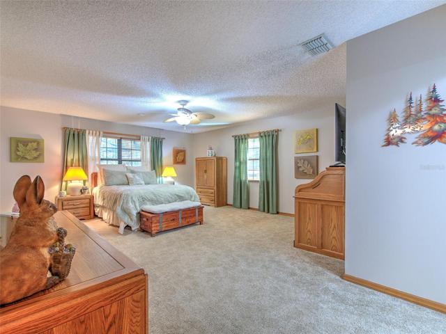 Master Bedroom (large room with double French doors to access screened in lanai)