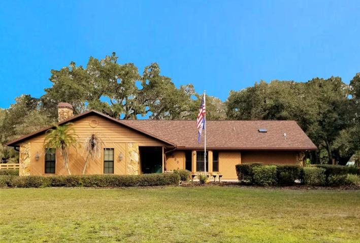 Ariel View of Property (*red boundary line is approximate) Custom Home(3 Bed/3 Bath/2 Car Garage on 2.06 acres) NEW ROOF & PAINT in 2022. Not in a Flood Zone, No HOA or CDD. Huge Pole Barn, Cowboy Kitchen, Fire Pit, Potting Shed, Vacant land & Huge Screened in Lanai.