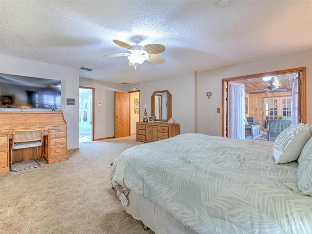 Master Bedroom (large room with double French doors to access screened in lanai)