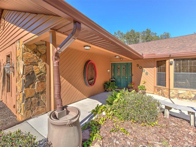 Front Entrance of Custom Home(3 Bed/3 Bath/2 Car Garage on 2.06 acres) NEW ROOF & PAINT in 2022. Not in a Flood Zone, No HOA or CDD.