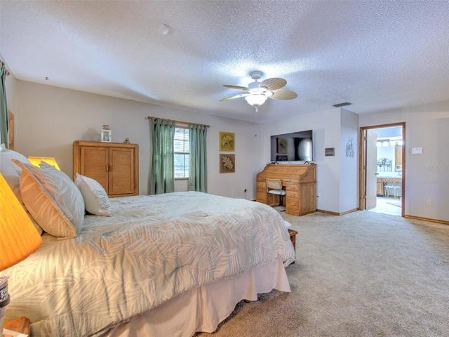 Master Bedroom (large room EnSuite Bathroom and double French doors to access screened in lanai)