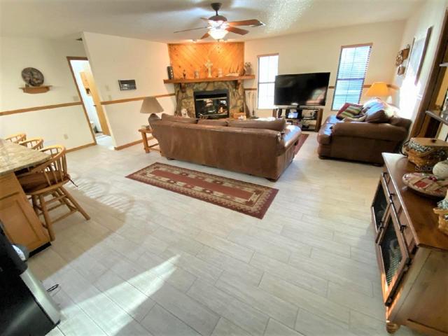 Family Room with Stone wood burning fireplace