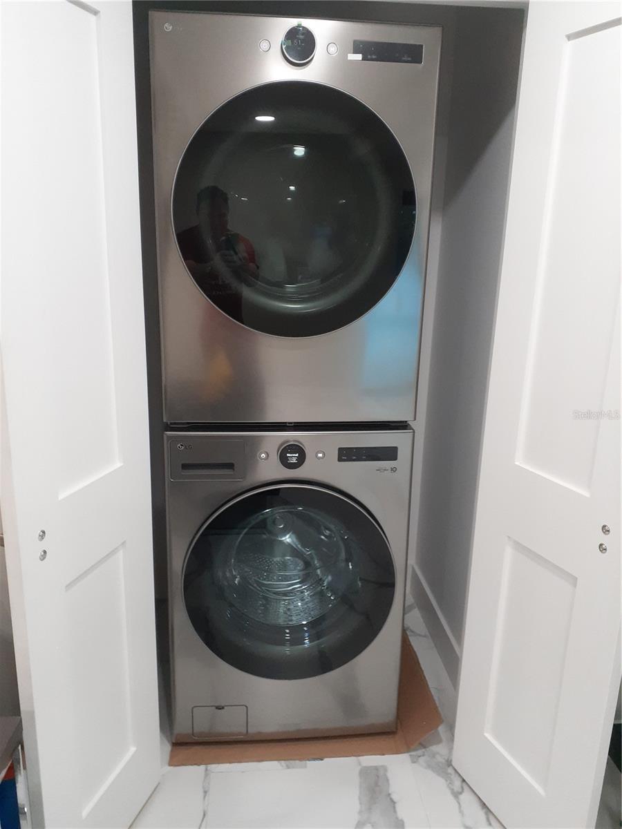 Brand new front loader washer &amp; dryer.