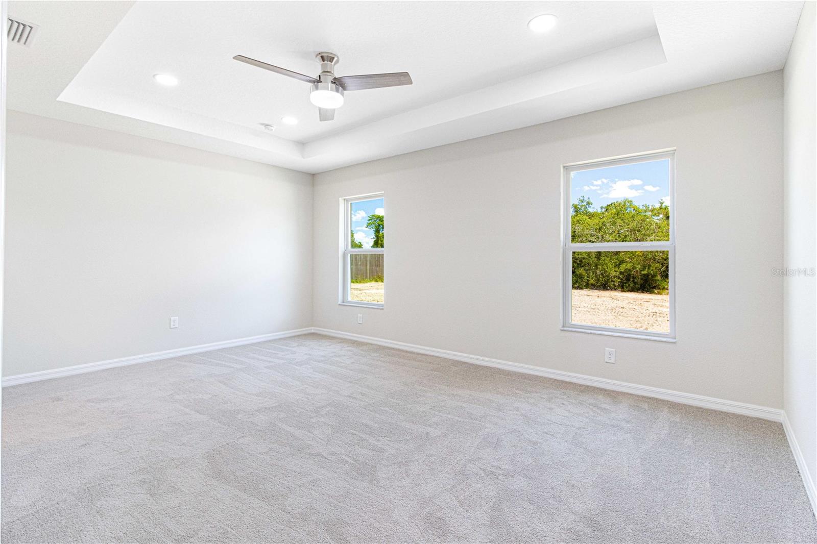 MASTER BEDROOM WITH TRAY CEILING