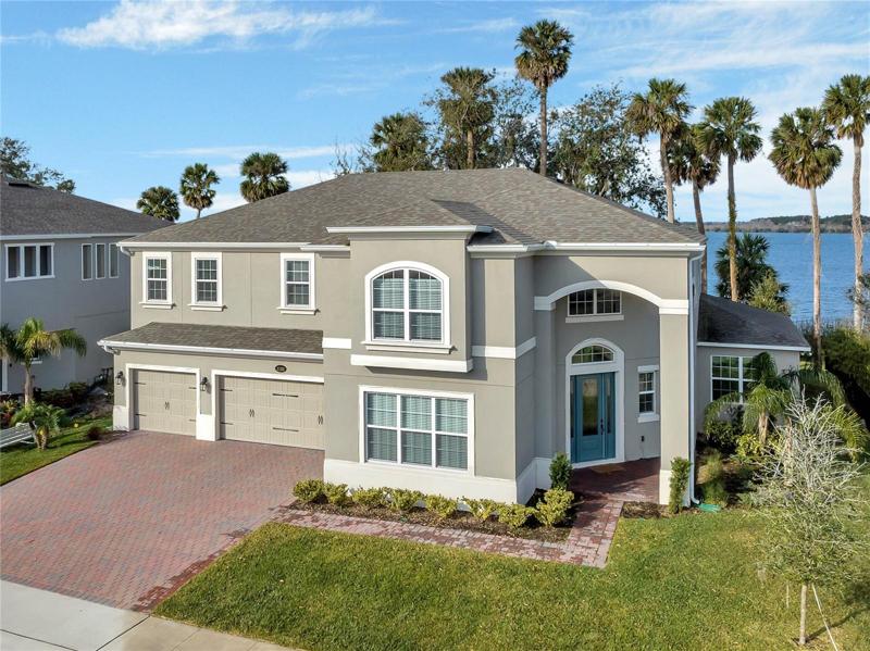 Front of property with lake behind