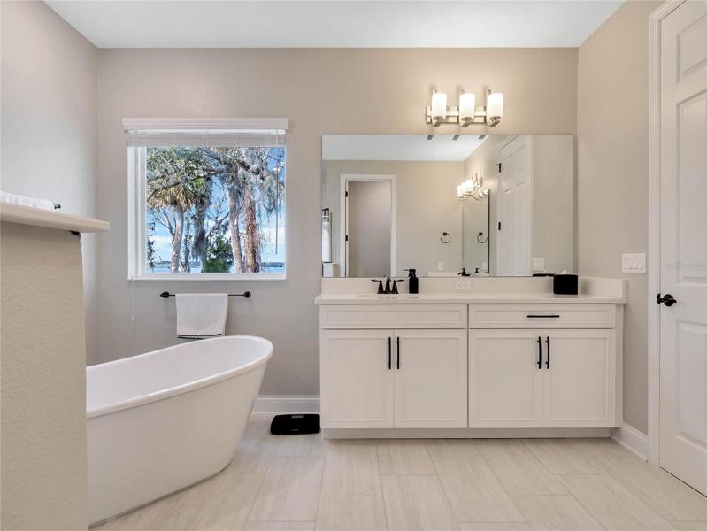 Separate vanities and large tub