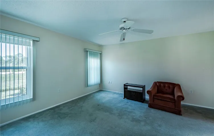 Master bedroom with plenty of room for a King size bed and additional furniture