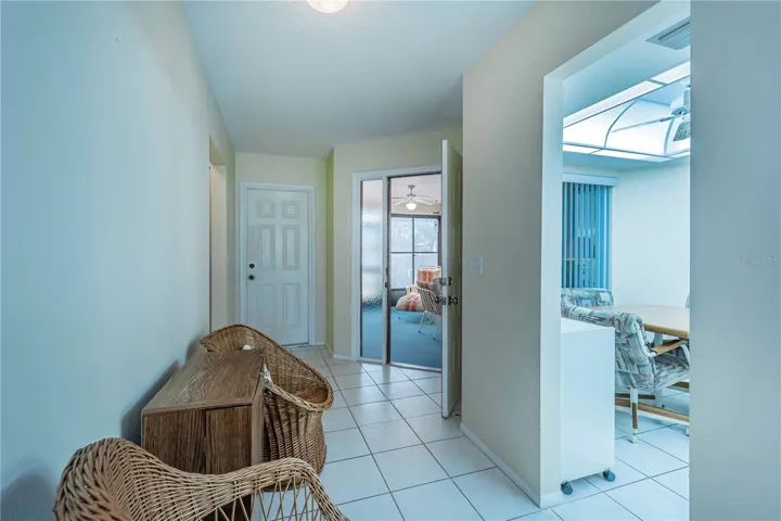 Pleasant foyer with room for chairs and a table in this entry foyer