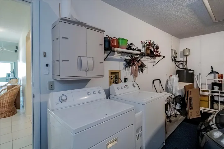 Washer and dryer in garage.