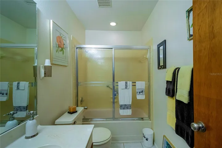 Guest bathroom with tub/shower combination.