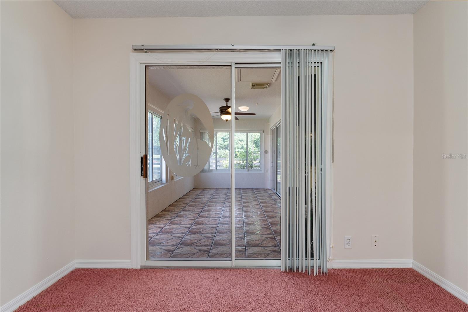 BR #2 - SLIDING GLASS DOORS lead to leisure room