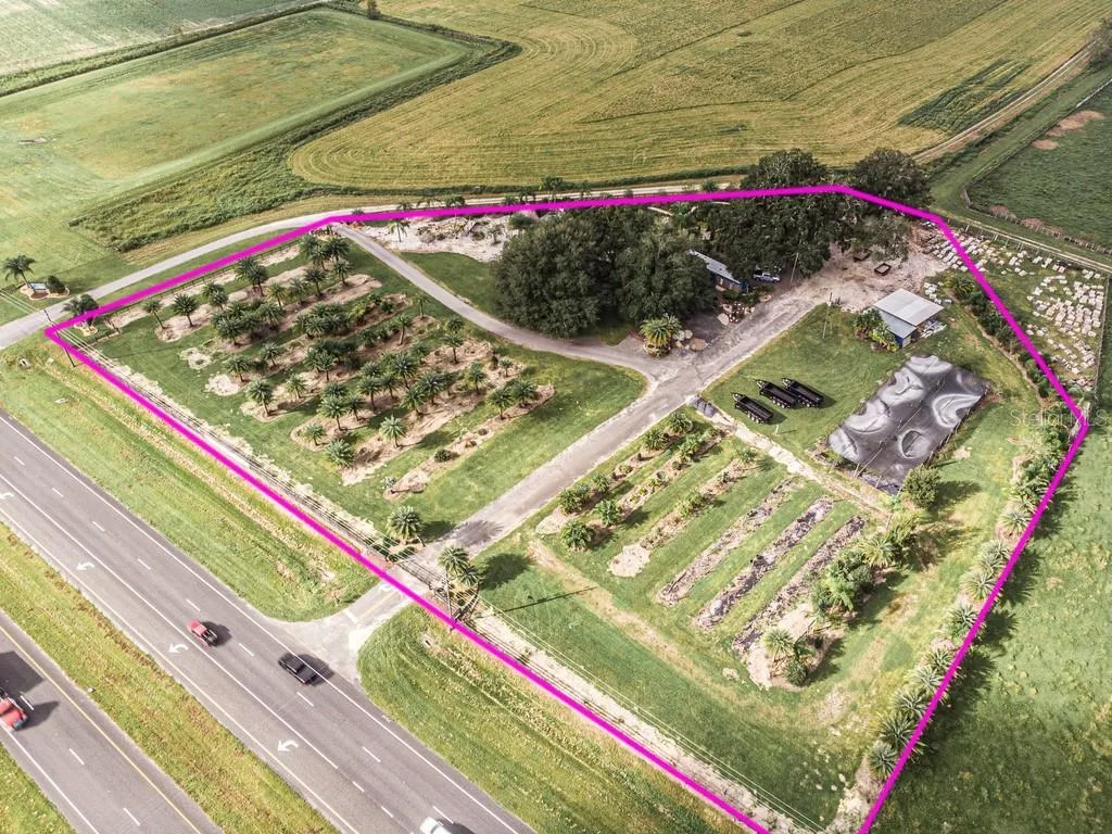 Aerial view of property with over 500 ft of road frontage