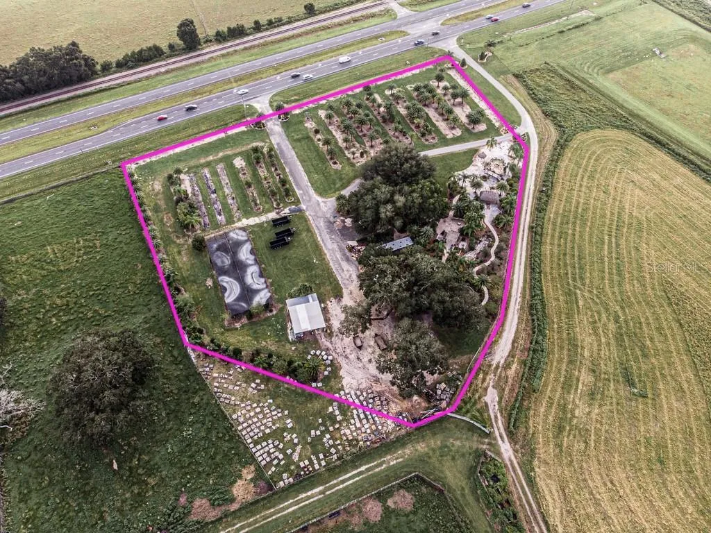Aerial view of property with over 500 ft of road frontage