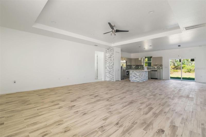 BRICK ACCENT WALL AND KITCHEN ISLAND