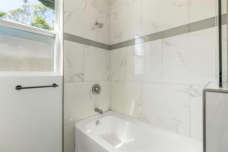 TILE UP TO CEILINGS IN BATHROOM